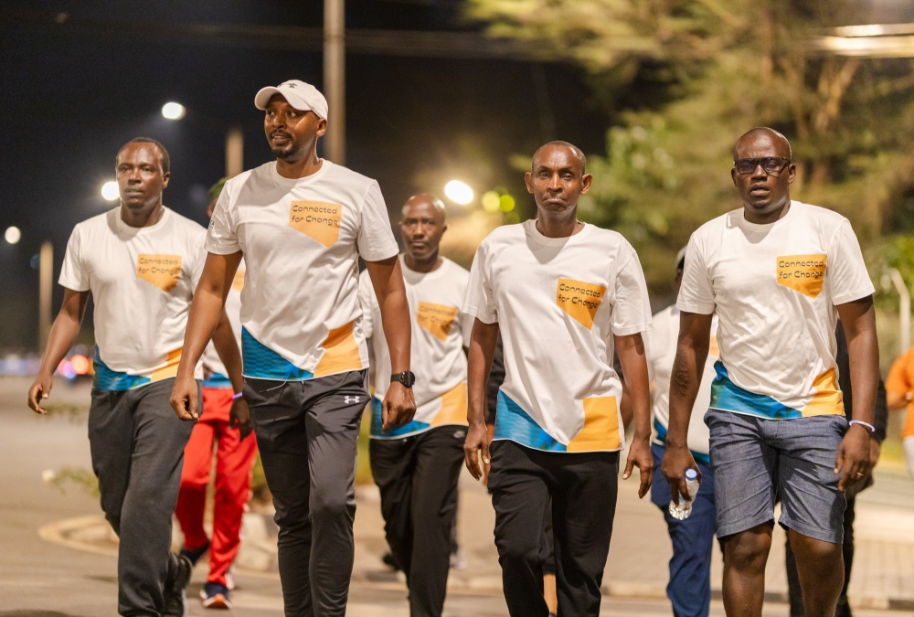 Minister of Health Dr Sabin Nsanzimana (c) joined hundreds of participants at the Night Run – Walk for Change, ahead of the conference on March 2. Courtesy