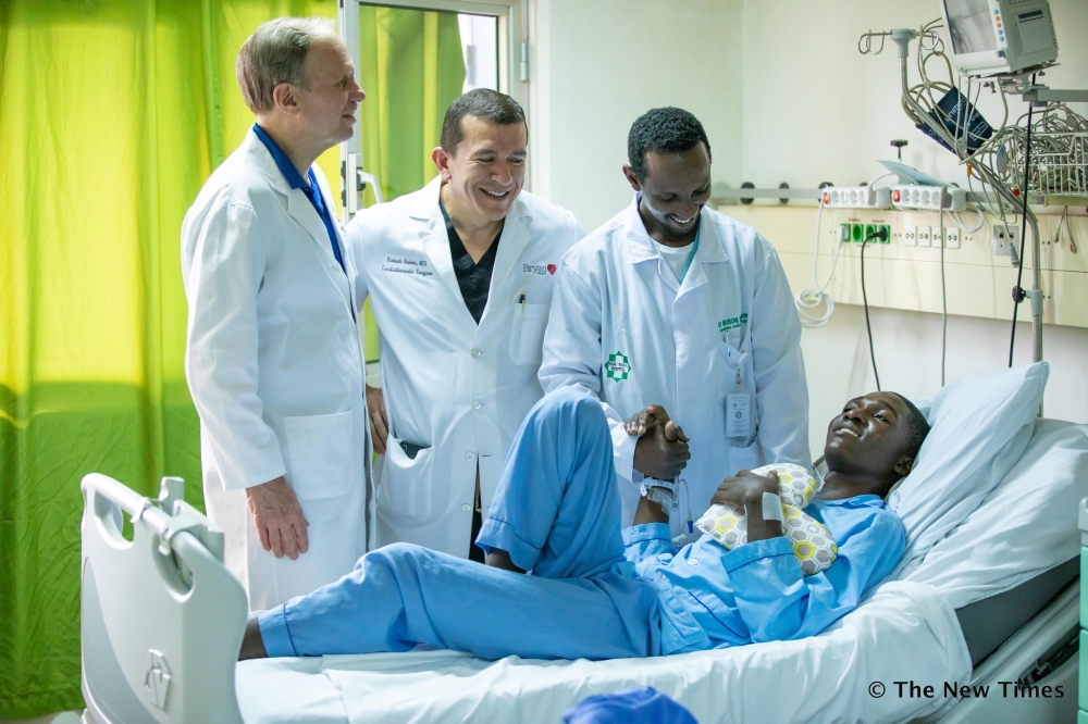 Dr. Maurice Musoni, Rwanda&#039;s first cardiothoracic surgeon and other medics interact with a patient at King Faical Hospital on February 13, 2020. Photo by Craish Bahizi