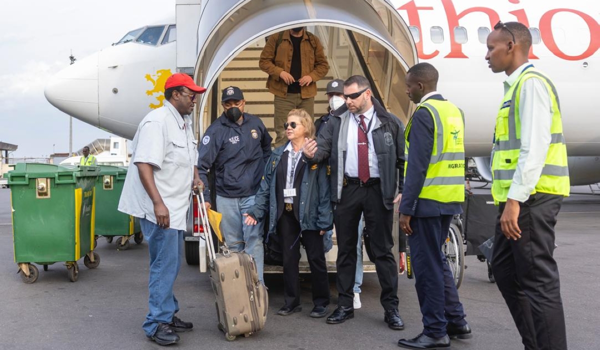 Ahmed Napoleon Mbonyunkiza, arrives at Kigali International Airport on Tuesday, March 4.  He was, in 2007, tried and convicted, in absentia, by the Nyakabanda Gacaca Court for his role in the 1994 Genocide against the Tutsi. Photos by Olivier Mugwiza