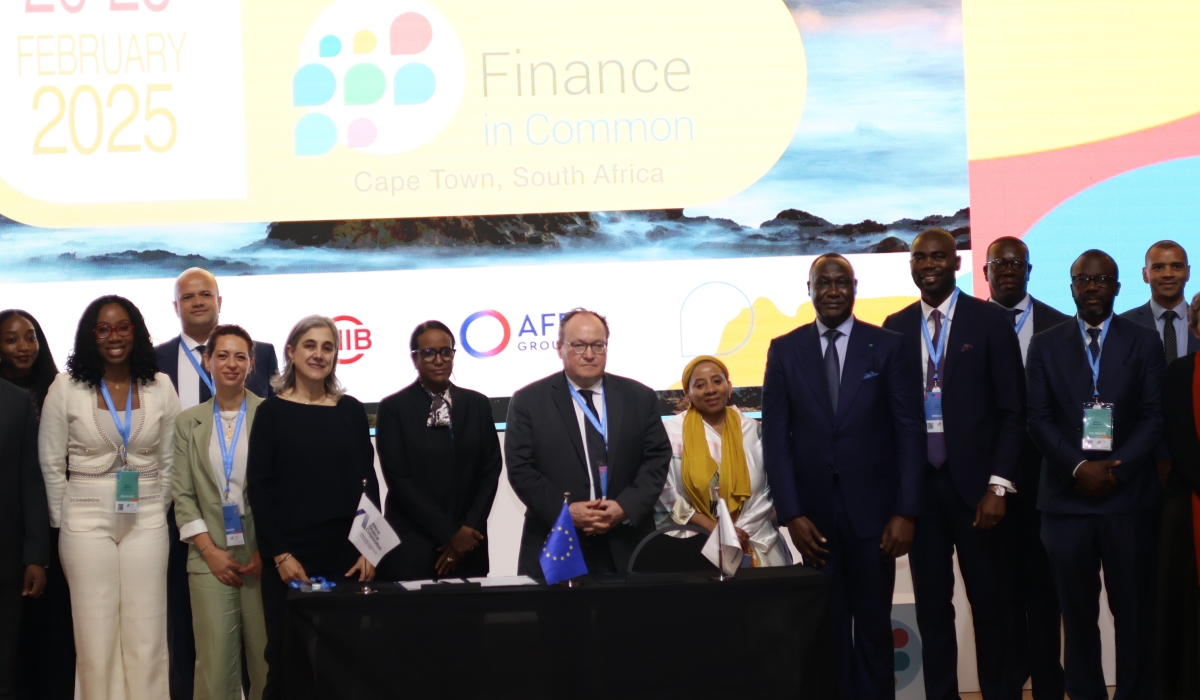 Officials pose for a group photo after the signing agreement. 