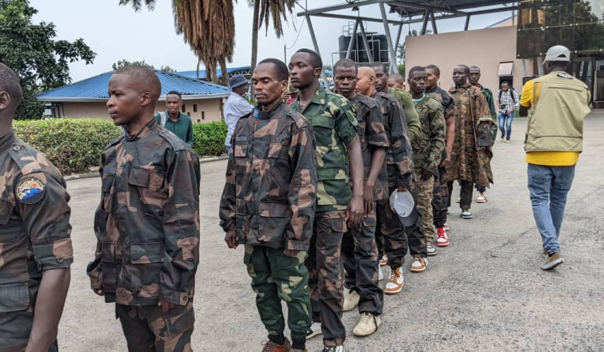 Some FDLR genocidal group memberes captured by M23 at the handover event in Rubavu District on Saturday, March 1. Rwanda faces an existential threat from the FDLR. Photo by Germain Nsanzimana.