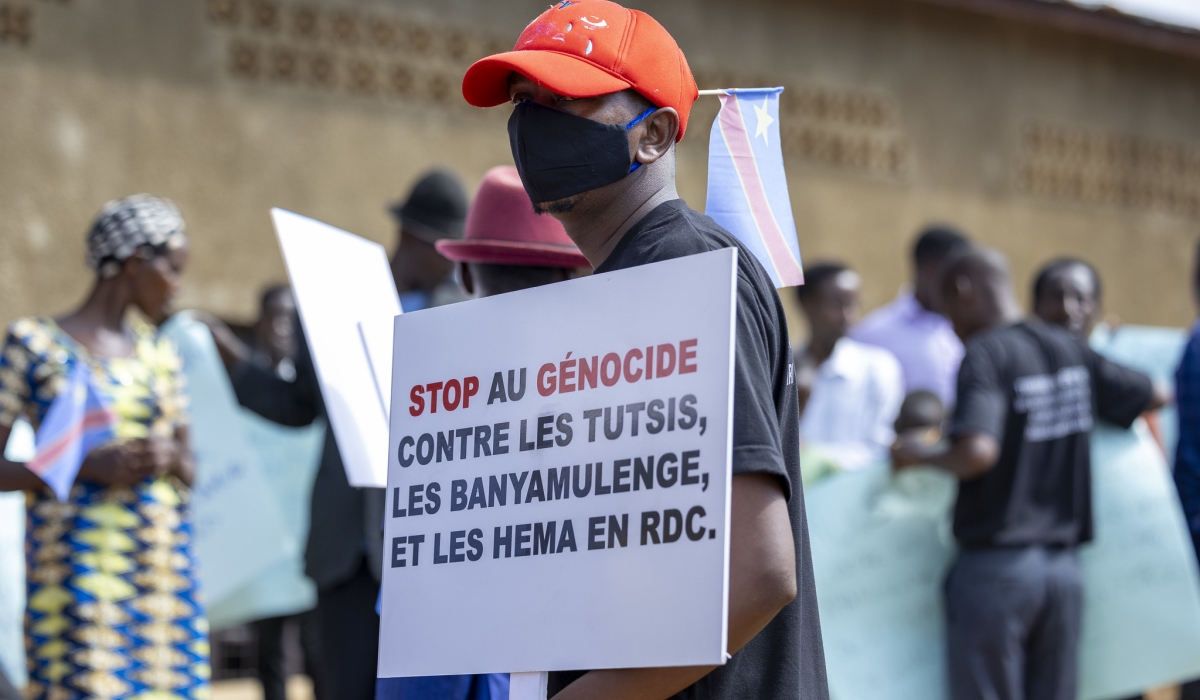 Congolese refugees from Kiziba camp during a peaceful march to call for action against the ongoing killings against Tutsi communities in DR Congo, on March 4, 2024. The association of survivors of the 1994 Genocide against the Tutsi, IBUKA, has condemned violence against Kinyarwanda-speaking communities, especially the Tutsi and Banyamulenge in DR Congo. Photo by Olivier Mugwiza