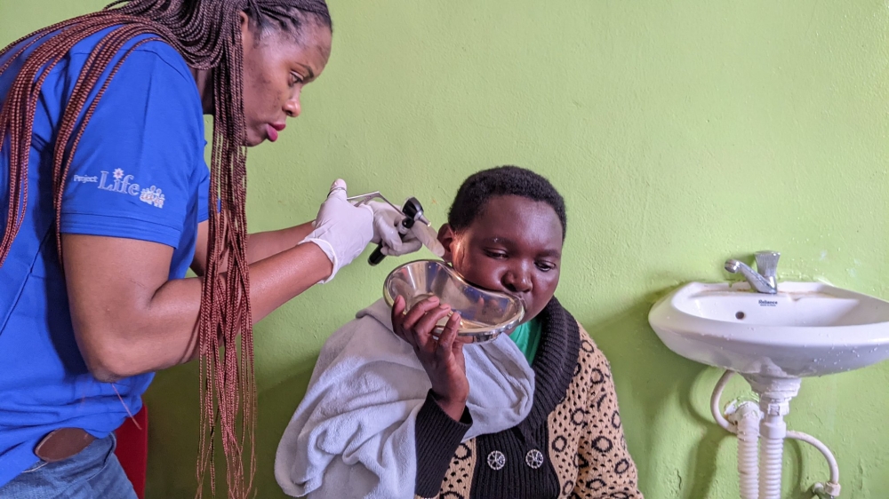 A specialist doctor examines a patient&#039;s ear at Muhoza Health Center in Musanze District during the celebration of World Hearing Day 2025. PHOTOS BY GERMAIN NSANZIMANA