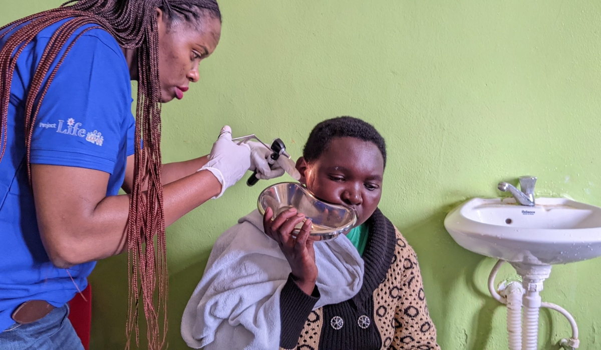 A specialist doctor examines a patient&#039;s ear at Muhoza Health Center in Musanze District during the celebration of World Hearing Day 2025. PHOTOS BY GERMAIN NSANZIMANA