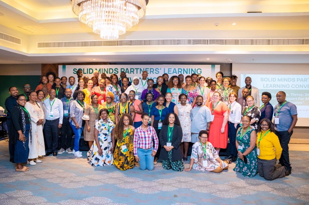 Participants pose for a group photo during the Solid Minds Partners Learning Convening in Kigali. Courtesy