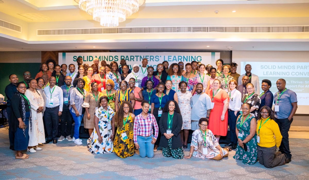 Participants pose for a group photo during the Solid Minds Partners Learning Convening in Kigali. Courtesy