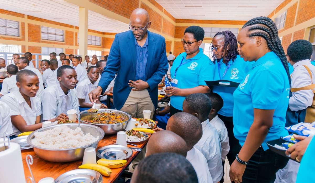 Minister of Education, Joseph Nsengimana (L) during the celebration of Africa Day of School Feeding at GS Kigali in Nyarugenge District on March 7. Courtesy