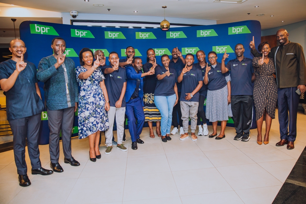 BPR Rwanda management and staff pose for a photo during a special celebration of the International Women&#039;s Day and  the bank’s 50-year legacy. Courtesy