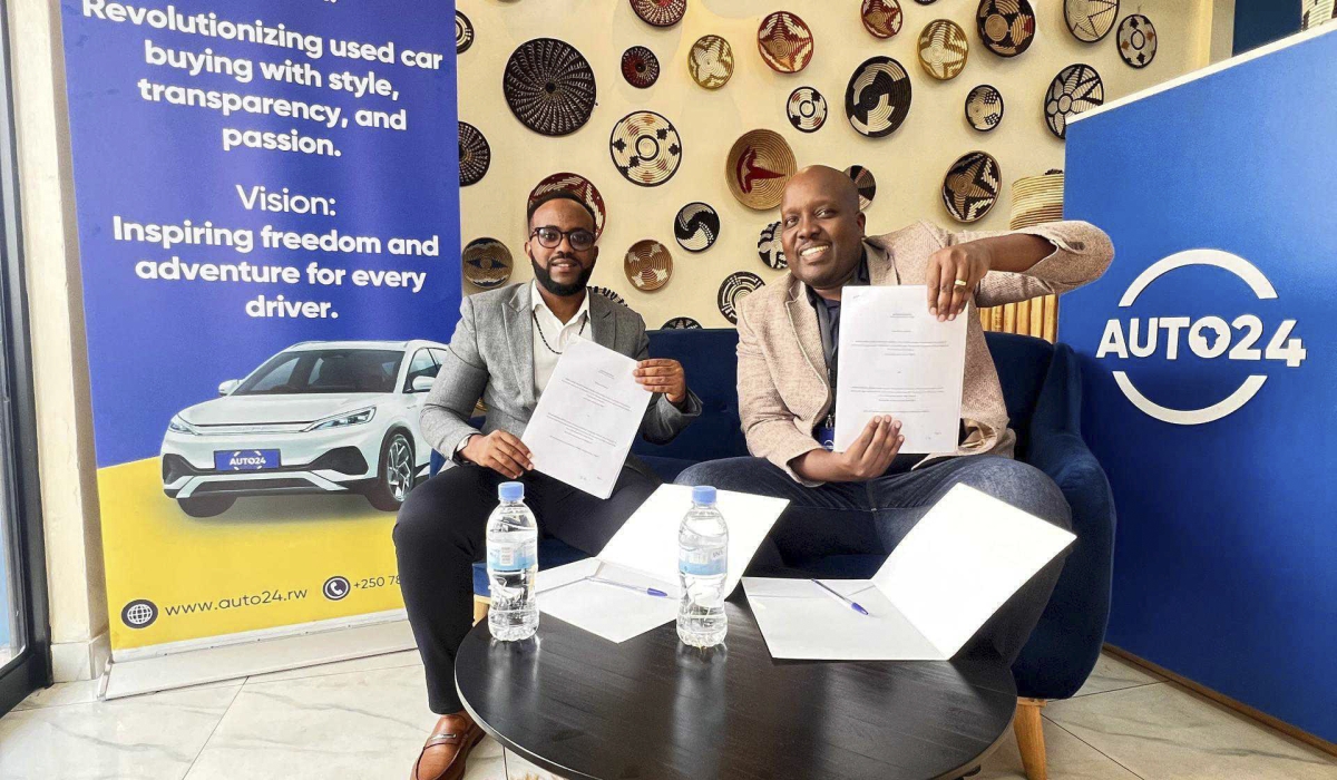 Regis Musanganya … In-coming Rwanda Director of Fleeti(L) and Ivan Ruzibiza,  Rwanda  Country Manager, Auto24 Africa during the signing of the agreement in Kigali. Fleeti, a specialist in connected fleet management solutions, and AUTO24.africa, signed an exclusive distribution contract covering all of the group&#039;s countries. COURTESY