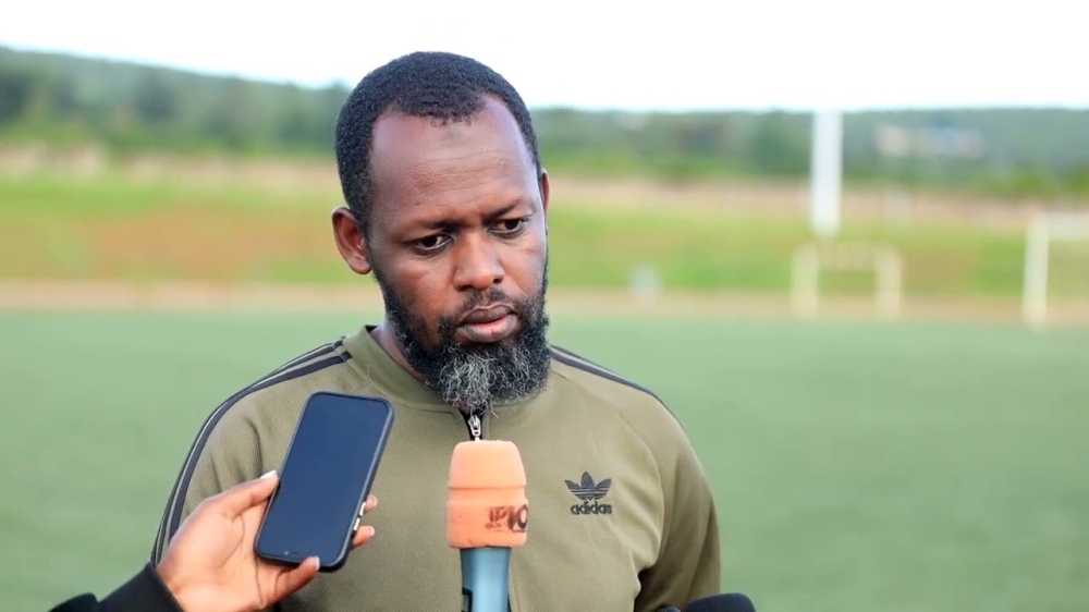 Marines head coach Yves Rwasamanzi speaks to journalists