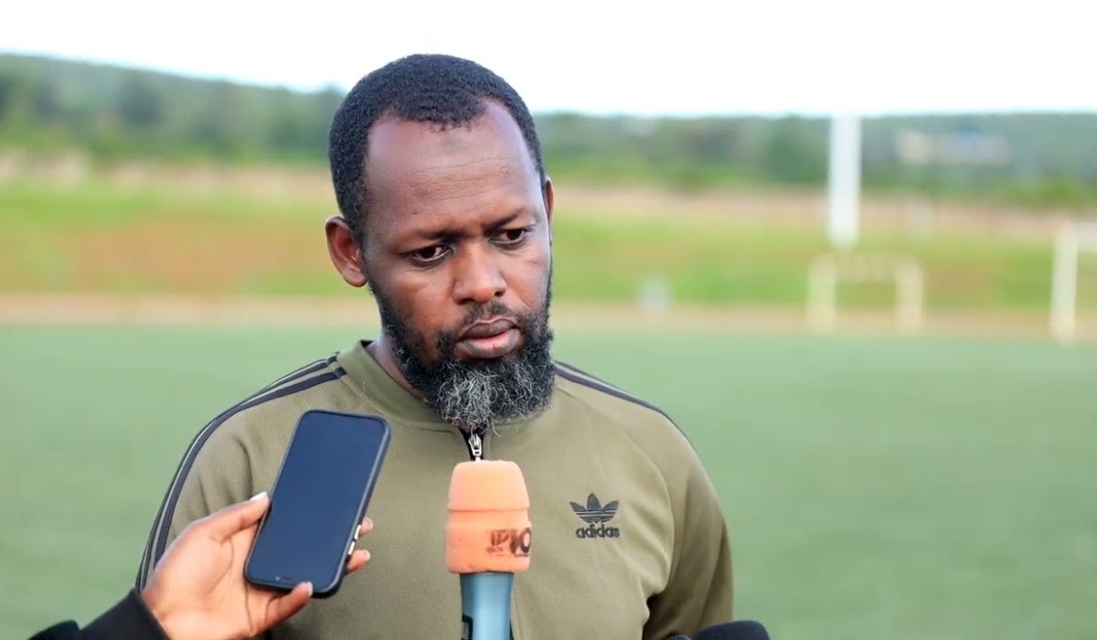 Marines head coach Yves Rwasamanzi speaks to journalists