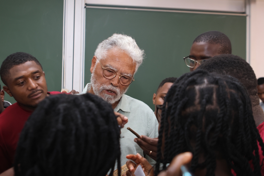 Georges Kamanayo showing students the ishango bone