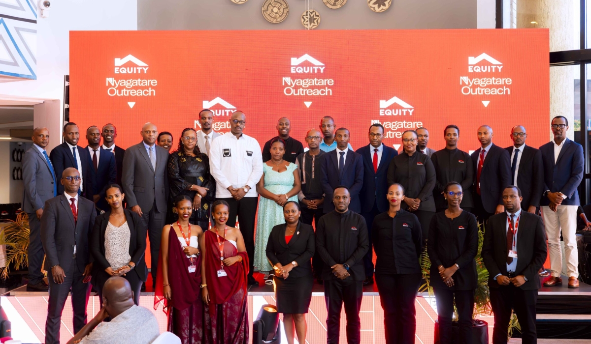 Equity Bank officials pose for a group photo with their customers in Nyagatare on Friday, March 21. Courtesy