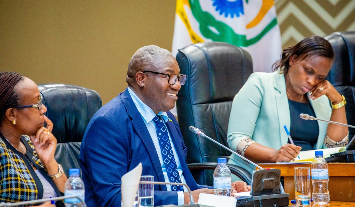 Minister of Local government Patrice Mugenzi addresses Members of Parliament  during a plenary session that discussed the social protection and poverty reduction programme on Tuesday, March 25.