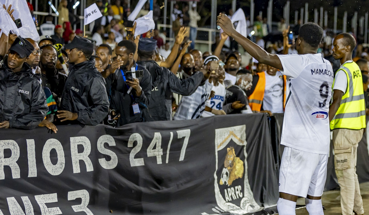 Striker Mamadou Sy celebrate with the APR fans after scoring the match winner in APR FC&#039;s 2-1 victory over Vision FC at Kigali Pele Stadium on Sunday, March 30-Photo by IGIHE
