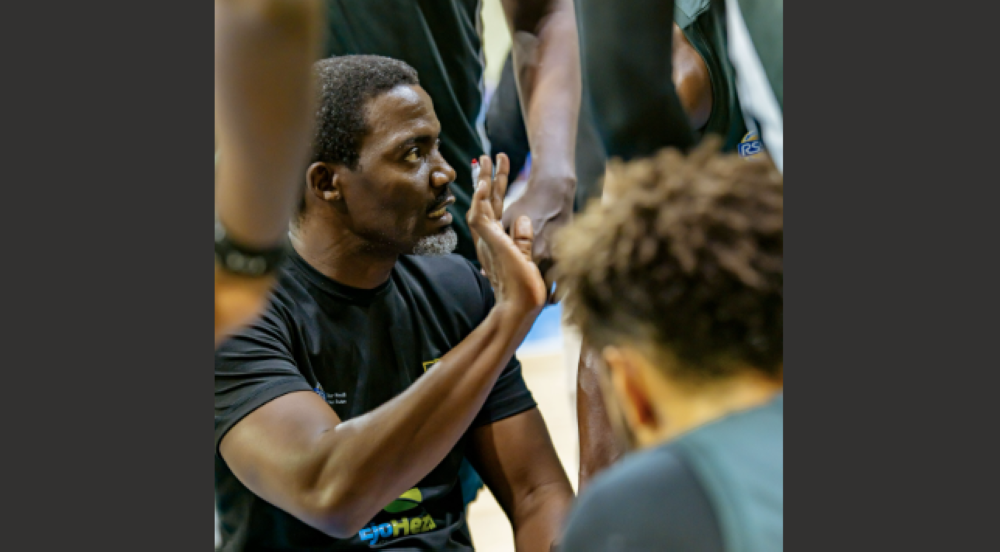 Tigers head coach Henry Mwinuka gives instructions to his players in Sunday&#039;s win over REG-Courtesy