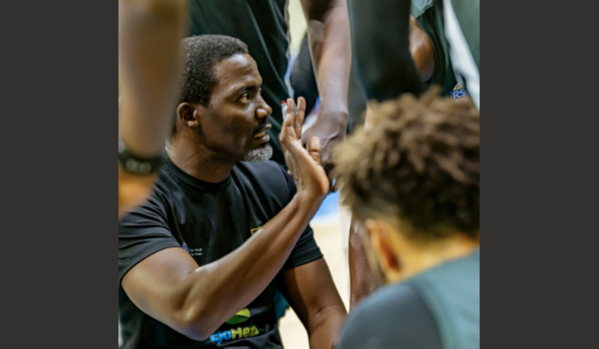 Tigers head coach Henry Mwinuka gives instructions to his players in Sunday&#039;s win over REG-Courtesy