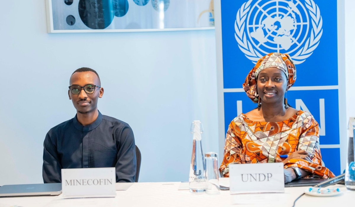 Kevin Sebineza, Director General of National Research at MINECOFIN, and Fatmata Lovetta Sesay, UNDP Resident Representative in Rwanda, alongside other officials, during the kick off meeting for the 4th National Human Development Report (NHDR) 2025 process. COURTESY PHOTOS
