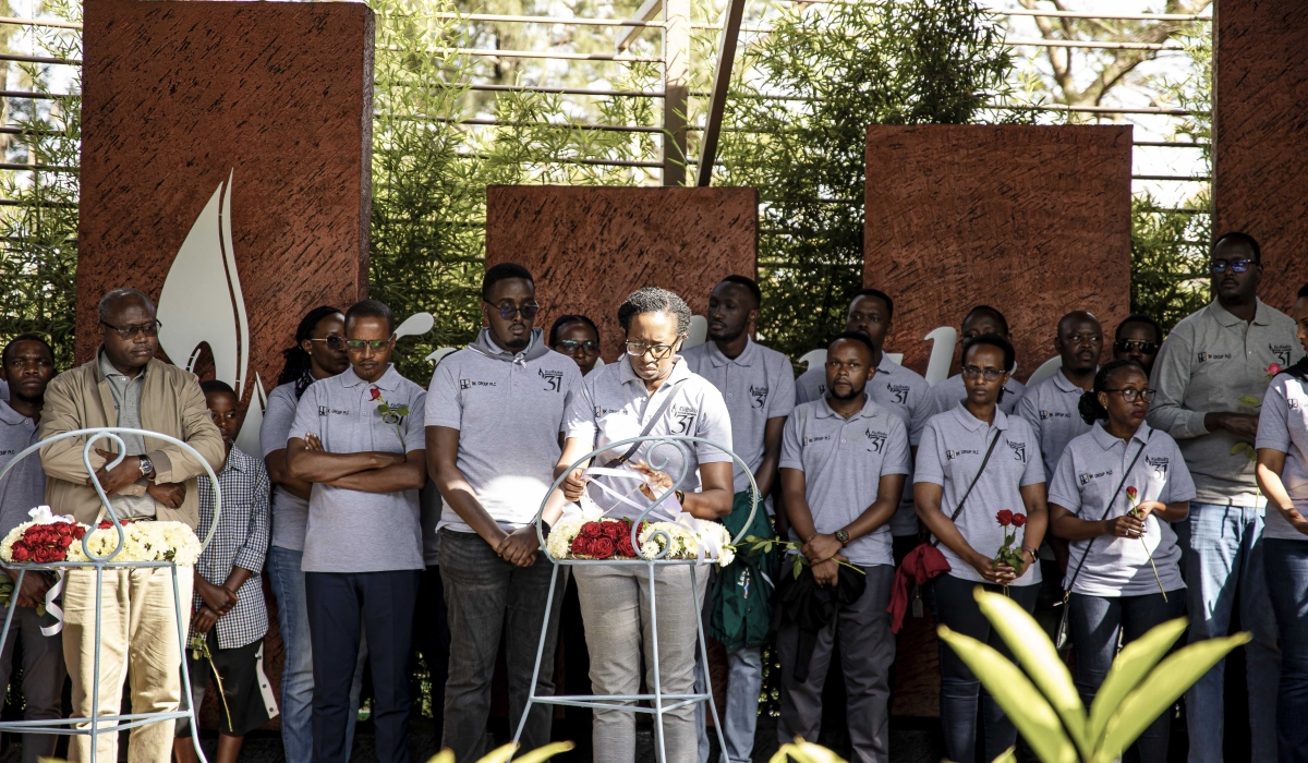 Bank of Kigali CEO Diane Karusisi lays a wreath to honour the victims of the 1994 Genocide against the Tutsi on April 11. Courtesy