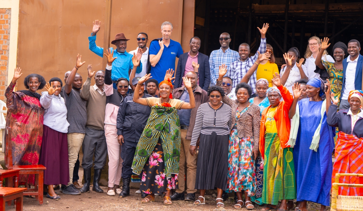 Representatives from the Swedish Embassy in Kigali, AFR, and MoneyPhone Africa engaged with local farmers  during a recent field visit in Cyuve sector, Musanze District