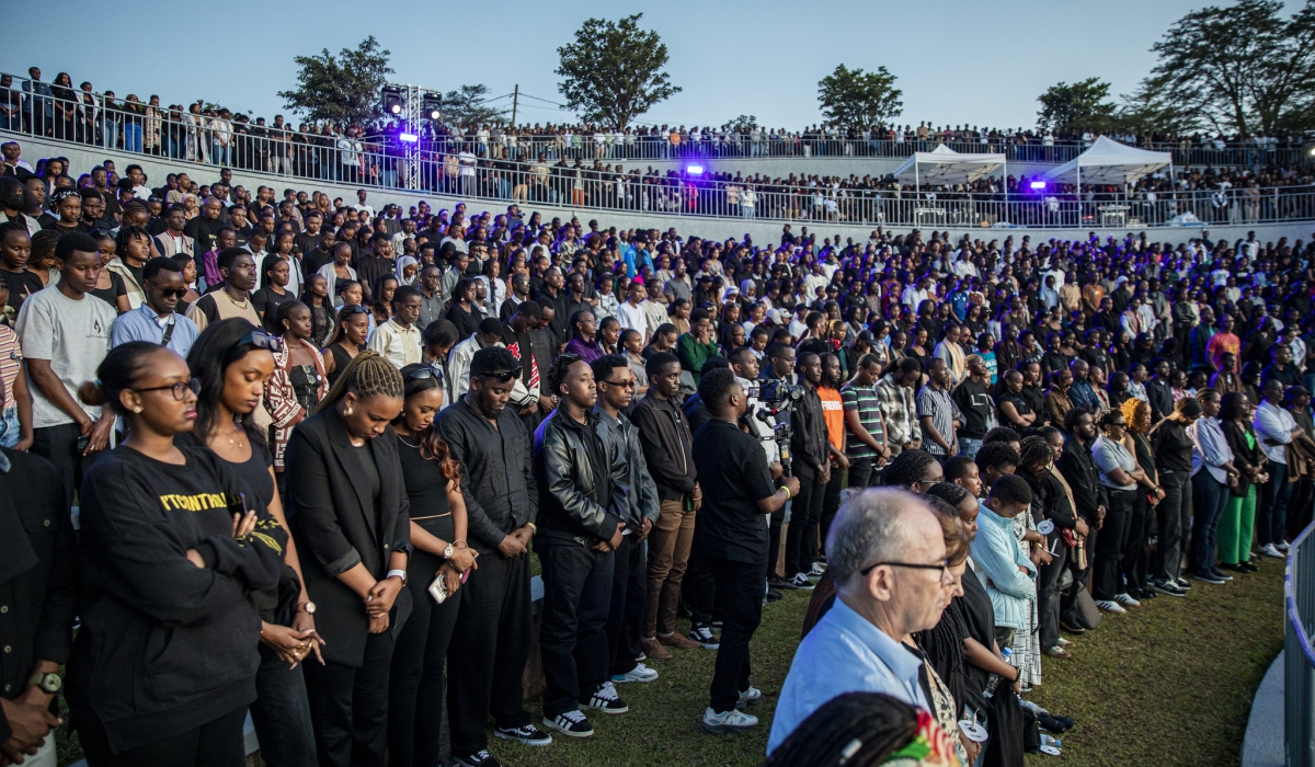 Thousands of youth observe a moment of silence during a commemoration event known as Our Past at Nyanza-Kicukiro Genocide Memorial. Dan Gatsinzi