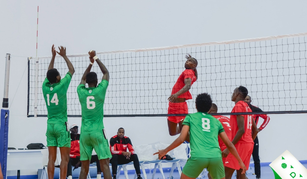 Kepler VC players attempt to block a shot by their Kenya Prison counterparts during the game.