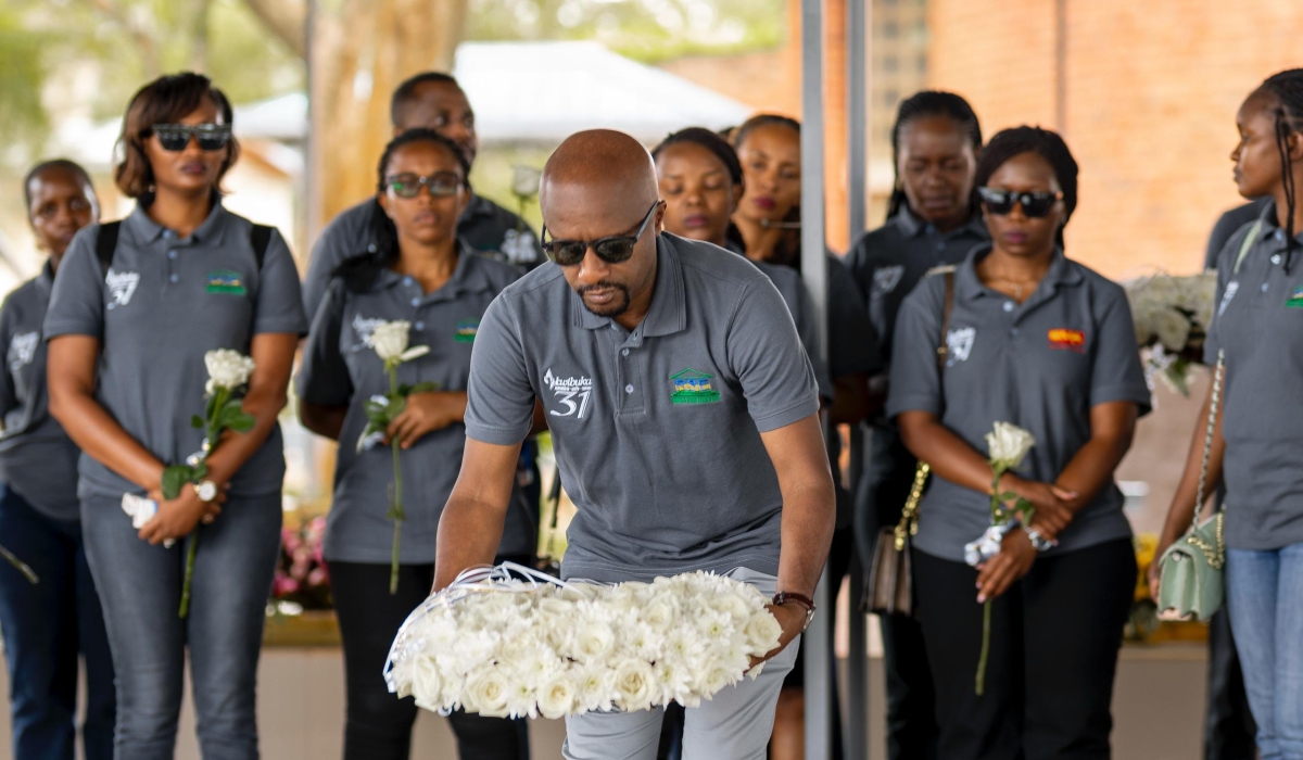 Pierre-Célestin Rwabukumba, CEO of RSE, lays a wreath at the Nyamata Genocide Memorial on Thursday, April 24. COURTESY PHOTOS