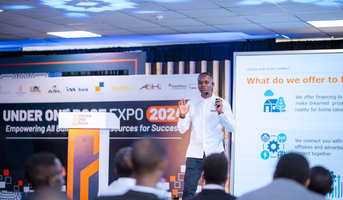 Yves Kayihura, the Head of Retail Banking at I&M Bank Rwanda, speaks at a meeting on mortgage loan.