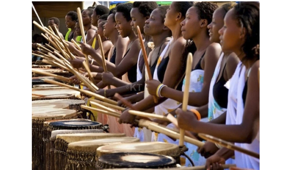 Rwandan women play drums during a ceremony in Rwanda. File