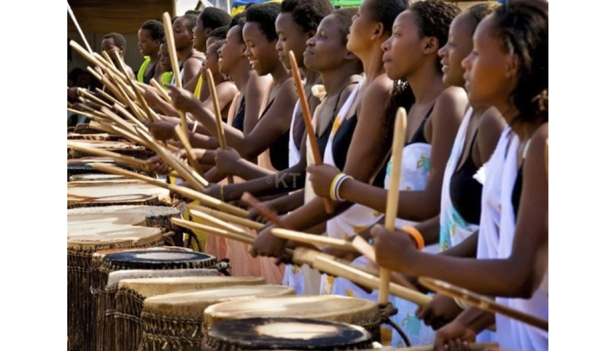 Rwandan women play drums during a ceremony in Rwanda. File