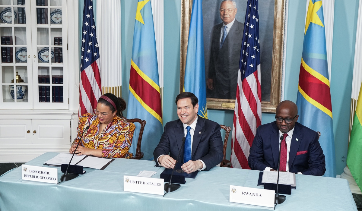 Rwanda&#039;s Minister of Foreign Affairs Olivier Nduhungirehe and his DR Congo counterpart Therese Kayikwamba Wagner sign the declaration of principles, witnessed by US Secretary of State Marco Rubio. Courtesy