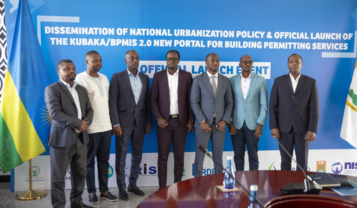 Officials pose for a photo at the launch of  the KUBAKA (BPMIS 2.0) portal in Kigali on Wednesday. PHOTOS BY CRAISH bAHIZI