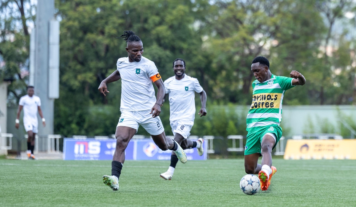 Muhazi United skipper Joseph Sackey fights for the ball in their pulsating 2-2 draw with Kiyovu on Thursday.
