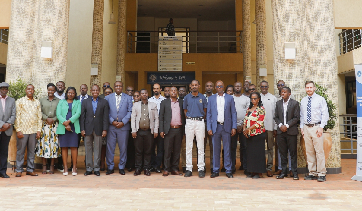 Officials and participants pose for a group photo as the University of Rwanda  and the National Council for Science and Technology launched a new project to boost research and innovation across the country. Kellya Kez
