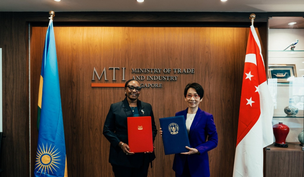 Minister of Environment Valentine Uwamariya and Singapore’s Minister for Sustainability and the Environment, Grace FU Hai Yien, during the signing of an Implementation Agreement on carbon market.