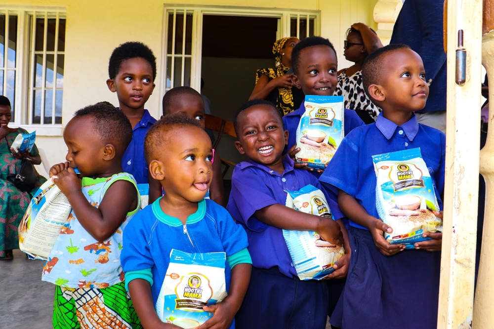 Children with Shisha Kibondo, a maize-soya fortified blend enriched with vitamins and minerals, is one of the tools in Rwanda’s fight against child malnutrition. File
