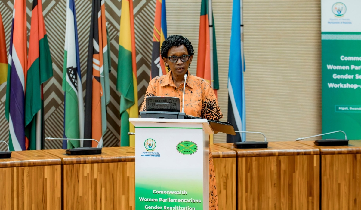 Speaker Gertrude Kazarwa, addresses delegates at the conference. She emphasized the importance of political will in achieving sustainable gender equality.