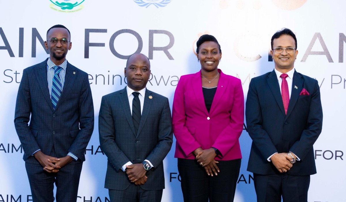 L-R: Menelas Nkeshimana, Head of the Health Workforce Department in the Ministry of Health,   Dr Olugbemiga Adelakin, UNFPA Country Representative, Claudette Nirere, the Minister of State for Education, Amb. Mridu Pawan Das, High Commission of India to Rwanda, pose for a photo at the launch in Kigali, on Tuesday, May 20.
Courtesy