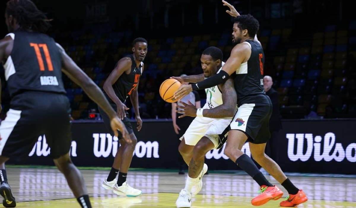 AL Ahli player vies for the ball as his side marked a 104–91 win over Nairobi City Thunder on Thursday. Photos by Olivier Mugwiza