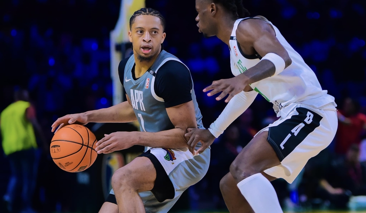 APR star Noel Obadiah under pressure from Al Ahli SC point guard Jean Jacques Boissy during Sturday clash which ended 106-102 in the Libyans&#039; favour-Photo by RBA