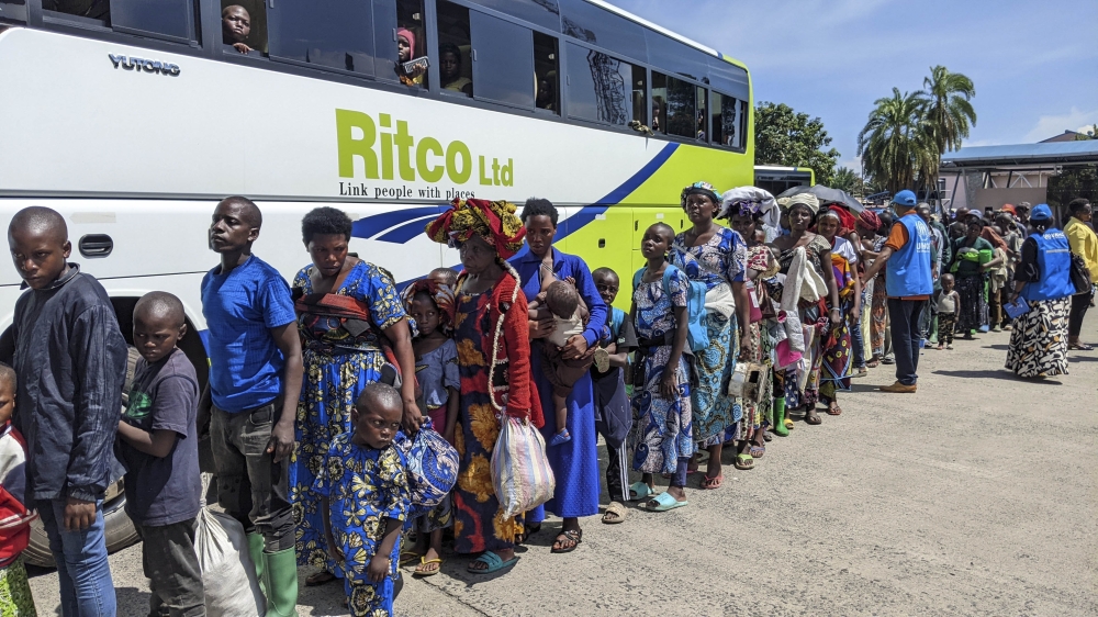 Some of the 642 Rwandan returnees who crossed from DR Congo at the Grande Barrière border post in Rubavu District on Thursday, May 22. Photo by Germain Nsanzimana