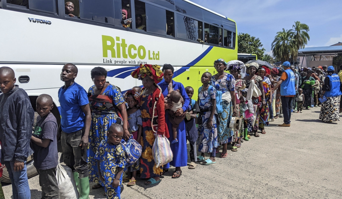 Some of the 642 Rwandan returnees who crossed from DR Congo at the Grande Barrière border post in Rubavu District on Thursday, May 22. Photo by Germain Nsanzimana