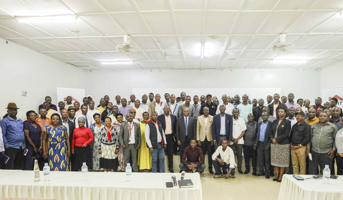 Farmers and officials pose for a group photo at the event in Rwamagana on May 24.