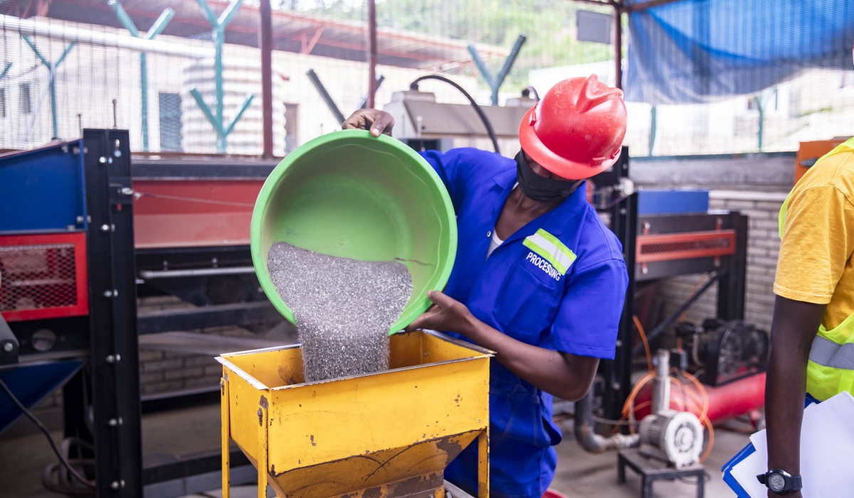 Miniers sort minerals at Rukaragata Mining Site in Ngororero District on March 4. Photo by Emmanuel Dushimimana