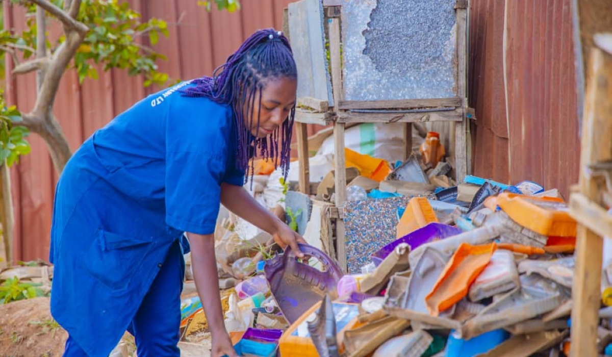 A worker sorts plastic waste at SIBO Engineering Company, one of local companies that deal with plastic waste recycling.