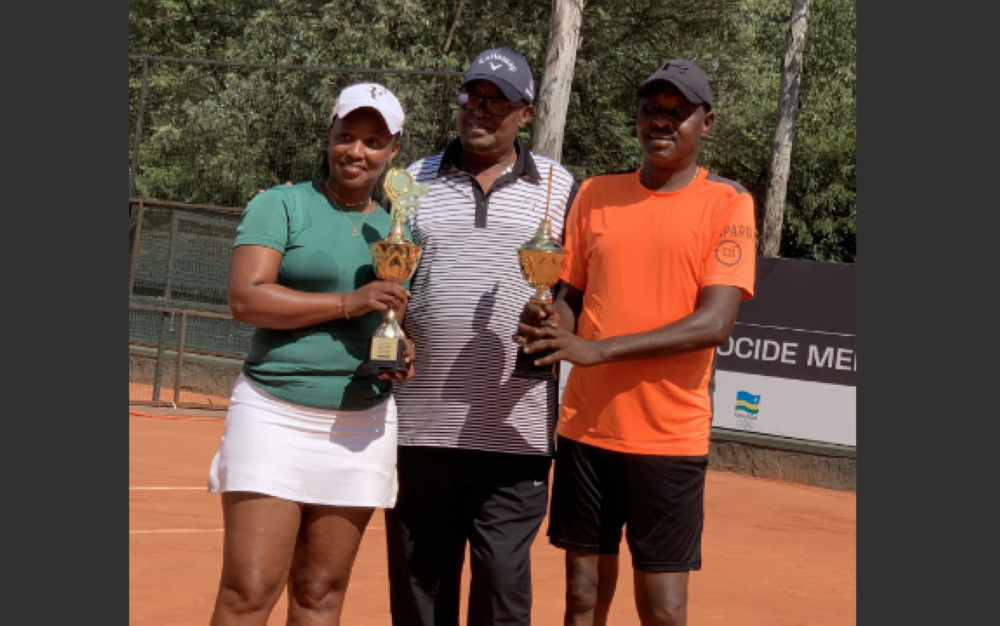 A pair of Tharcisse Rutayisire and Joseline Umulisa holding the trophy of He for She challenger