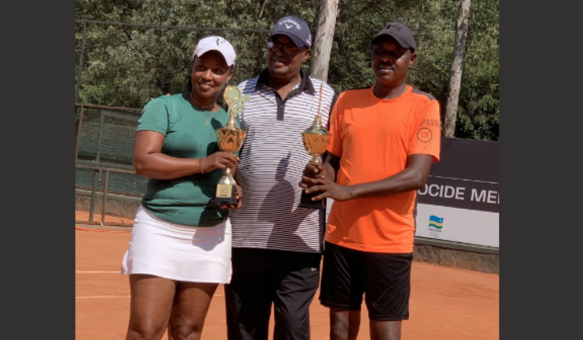 A pair of Tharcisse Rutayisire and Joseline Umulisa holding the trophy of He for She challenger
