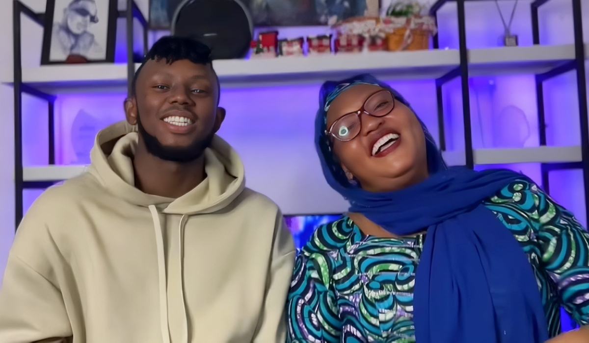 Chriss Eazy pictured with his late mother, who was a frequent presence in his life and work, including on his YouTube channel. COURTESY.