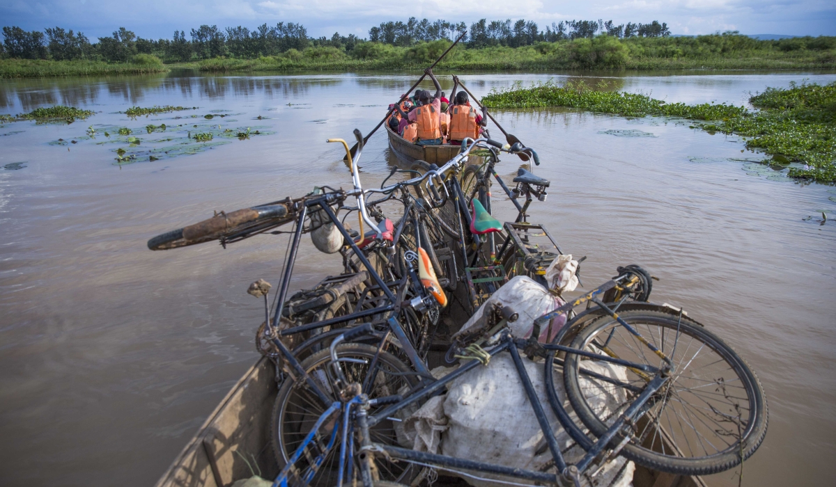 Residents travel to Sharita Island in Rweru Sector, Bugesera District, on May 3, 2024. The island is among several where inhabitants are set to be relocated. Photo by Sam Ngendahimana