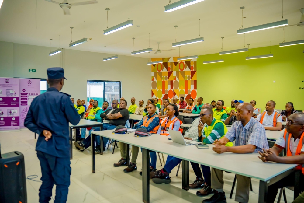 Rwanda National Police Officer addresses Bralirwa employees during the Employee Dialogue at the Rubavu Brewery, in Nyamyumba Sector. Courtesy